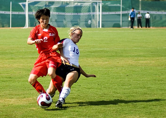 women playing football women playing football