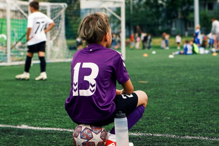 sitting on the sidelines during football match sitting on the sidelines during football match