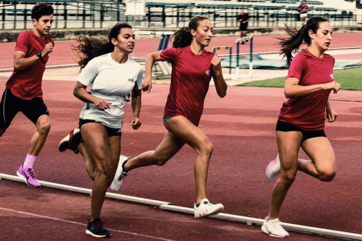 students racing on running track students racing on running track