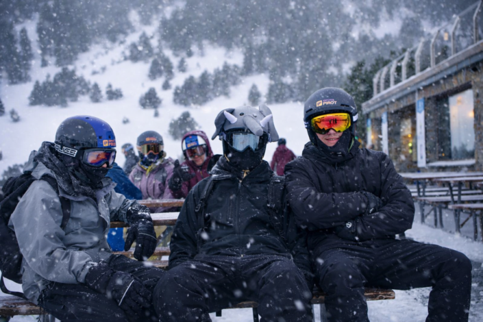 Students enjoying school ski trip in the snow sure destination of Andorra