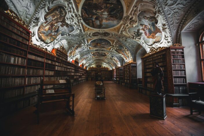 Medieval Archives Library Historic European library filled with old books, illustrating historical research and learning on school history trips